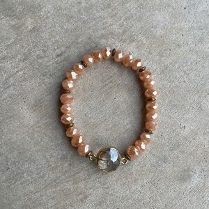 Pink and Gold Beaded Bracelet with Circle Pendant